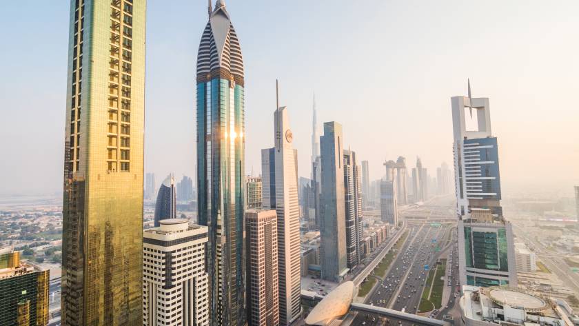 Dubai, UAE - October, 2018. Dubai skyline and downtown skyscrapers on sunset. Modern architecture concept with highrise buildings on world famous metropolis in United Arab Emirates